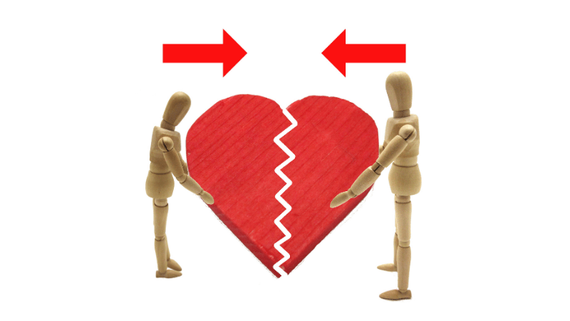 Two people standing either side of a heart - referral program reciprocity